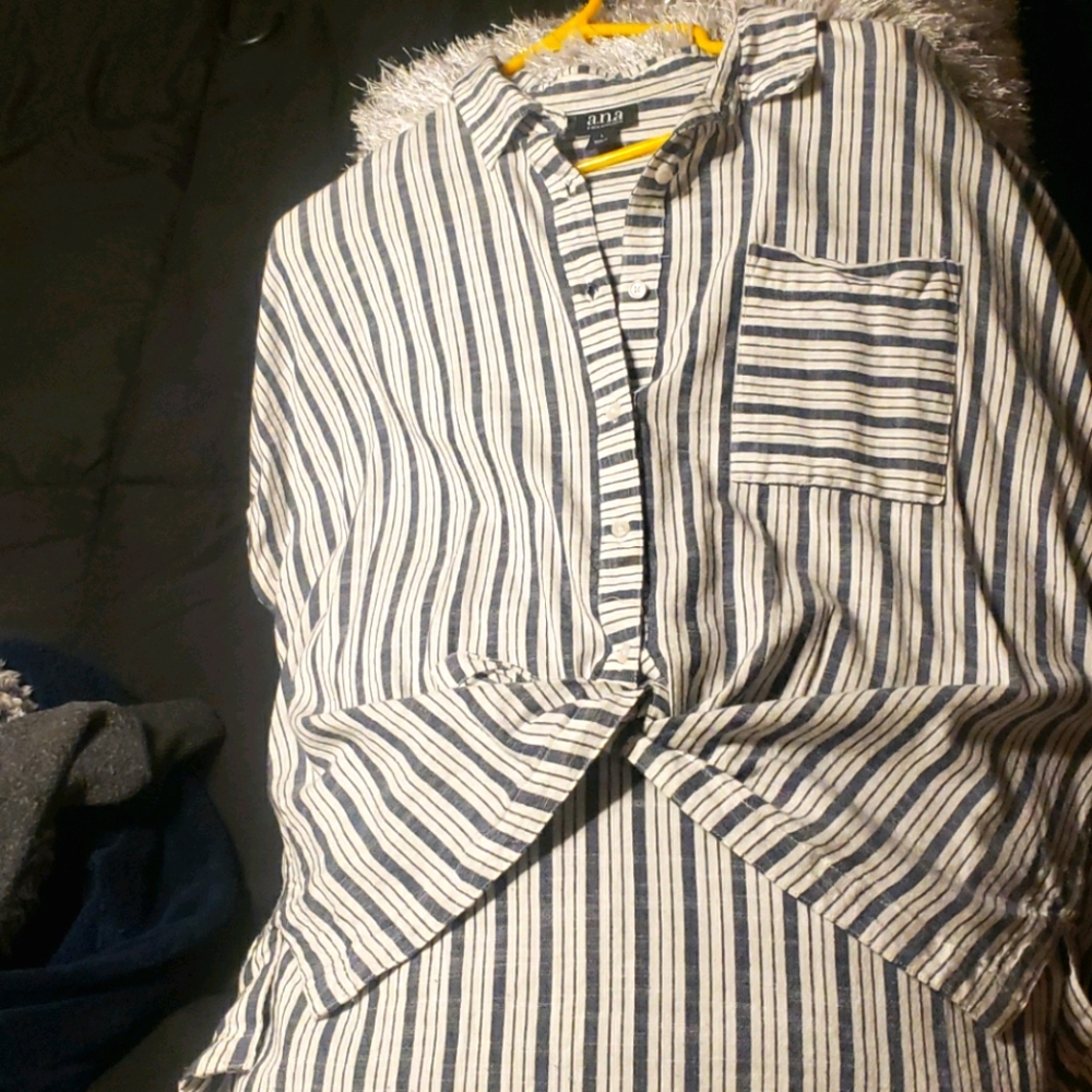 Button up blouse rolled sleeves.